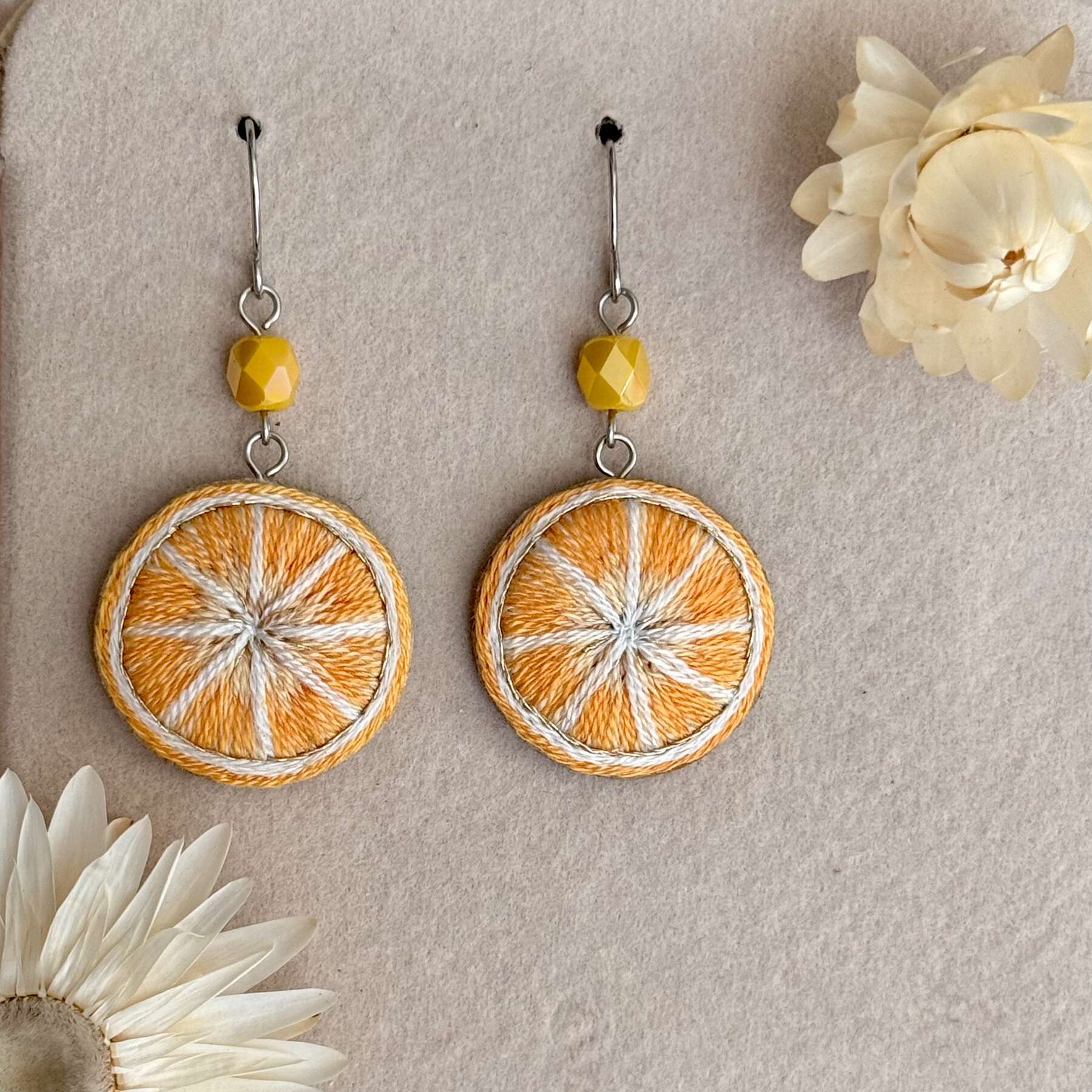 Appelsiinit korvakorut